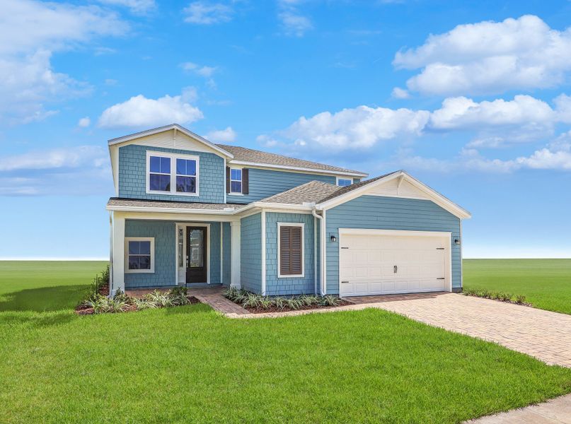 Front exterior of a new home in Russell Retreat, Green Cove Springs, FL, highlighting curb appeal (Image 1).