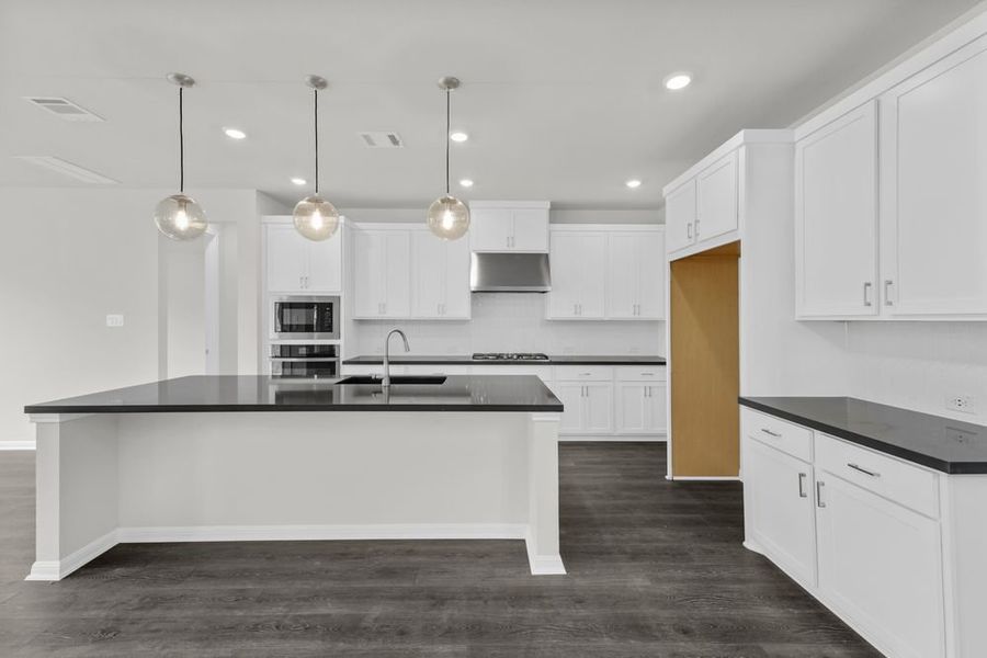 Furnished interior view inside a new home in Parkside on the River 60s, Georgetown (Image 4).