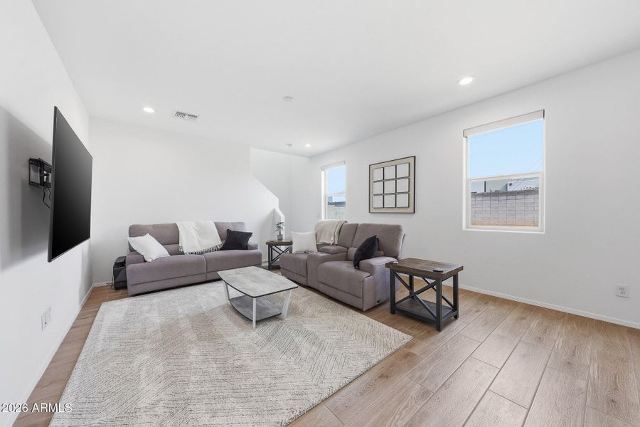 Great room with motorized blinds Great room with motorized blinds