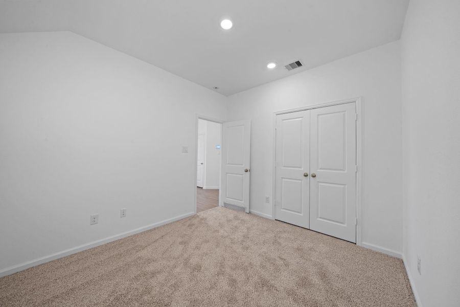 Spacious, unfurnished interior of a new home in Sunterra: Bristol Collection, Katy (Image 13).