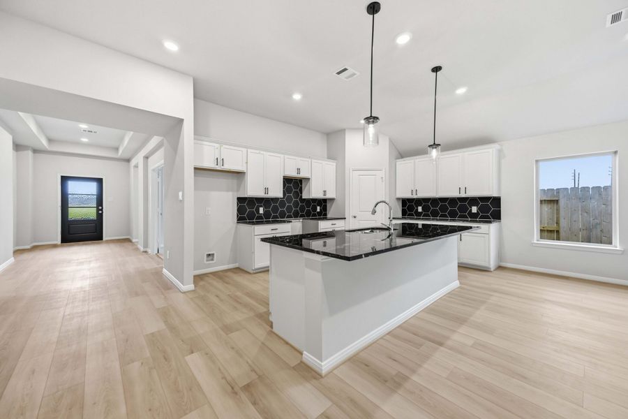 Furnished interior view inside a new home in Sundance Cove, Crosby (Image 4).