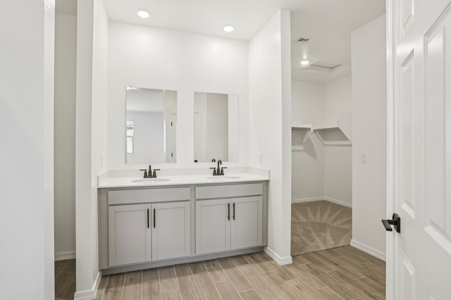 Primary bath. Finishes and options may vary by community