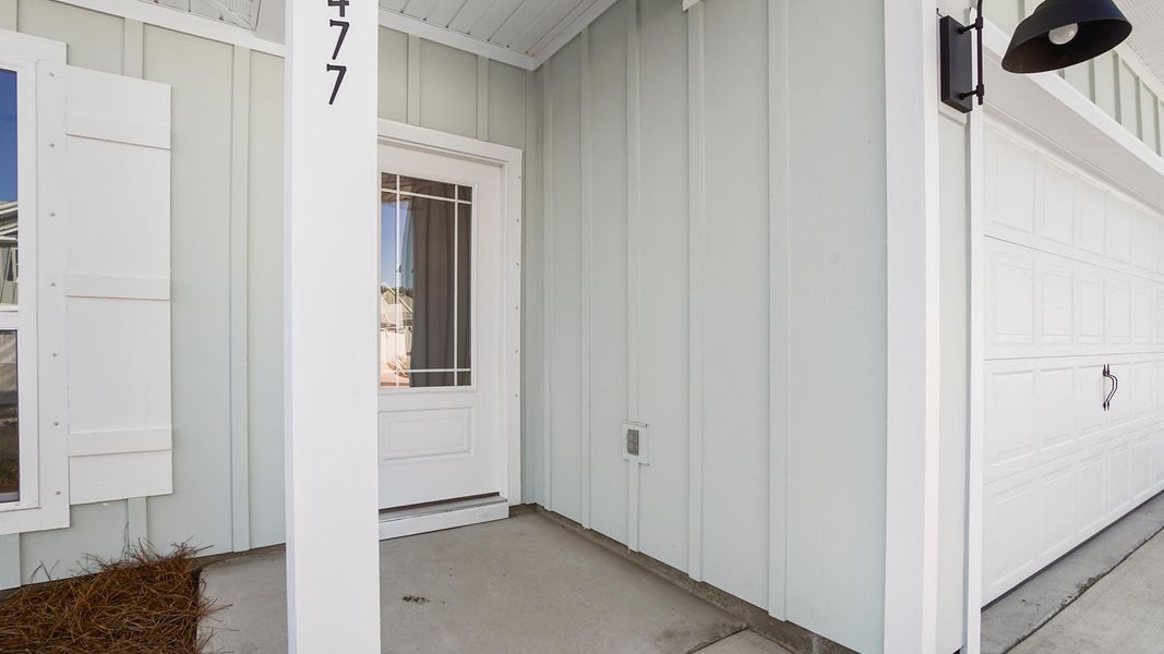 Exterior details and patio area of a home in Caballeros Estates At Hombre, Panama City Beach (Image 3).