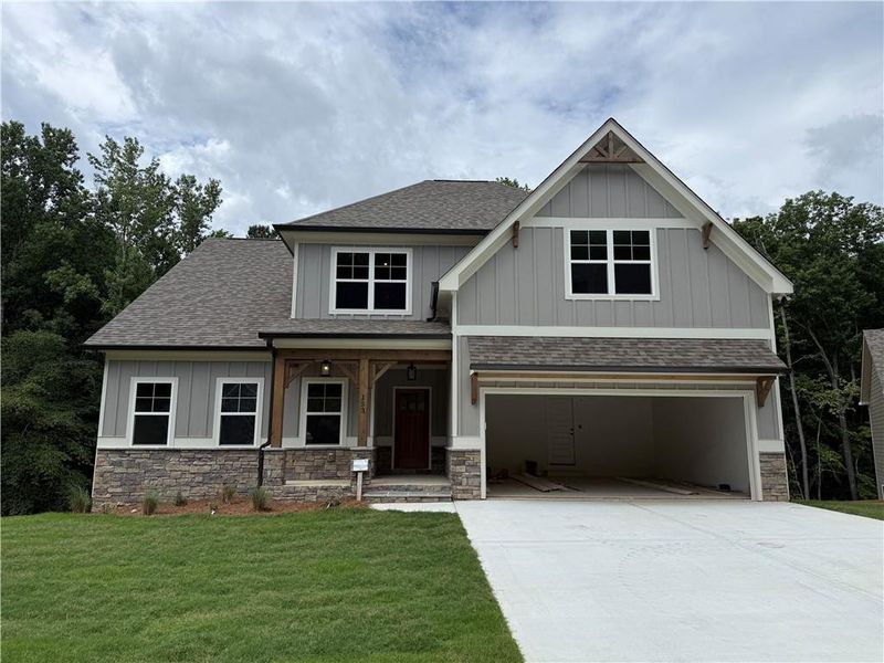 Front exterior of a new home in , Waleska, GA, highlighting curb appeal (Image 21). Front exterior of a new home in , Waleska, GA, highlighting curb appeal (Image 21).