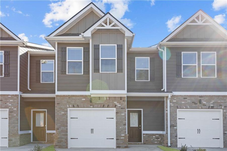 Front exterior of a new home in Azalea Hills, Temple, GA, highlighting curb appeal (Image 1). Front exterior of a new home in Azalea Hills, Temple, GA, highlighting curb appeal (Image 1).