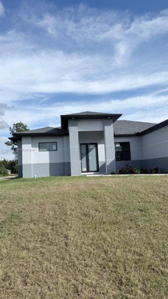 Exterior details and patio area of a home in , Lehigh Acres (Image 29). Exterior details and patio area of a home in , Lehigh Acres (Image 29).