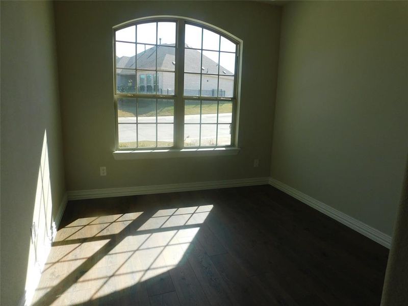 2nd bedroom looks out to the front of the home