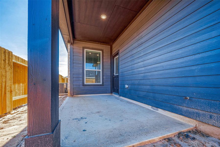 Exterior details and patio area of a home in Mill Creek Trails, Magnolia (Image 3).