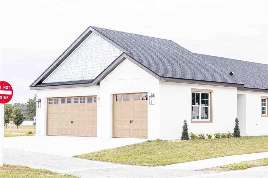 Front exterior of a new home in , Oxford, FL, highlighting curb appeal (Image 32).