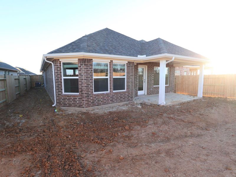 Exterior details and patio area of a home in Wildrye, Waller (Image 4).