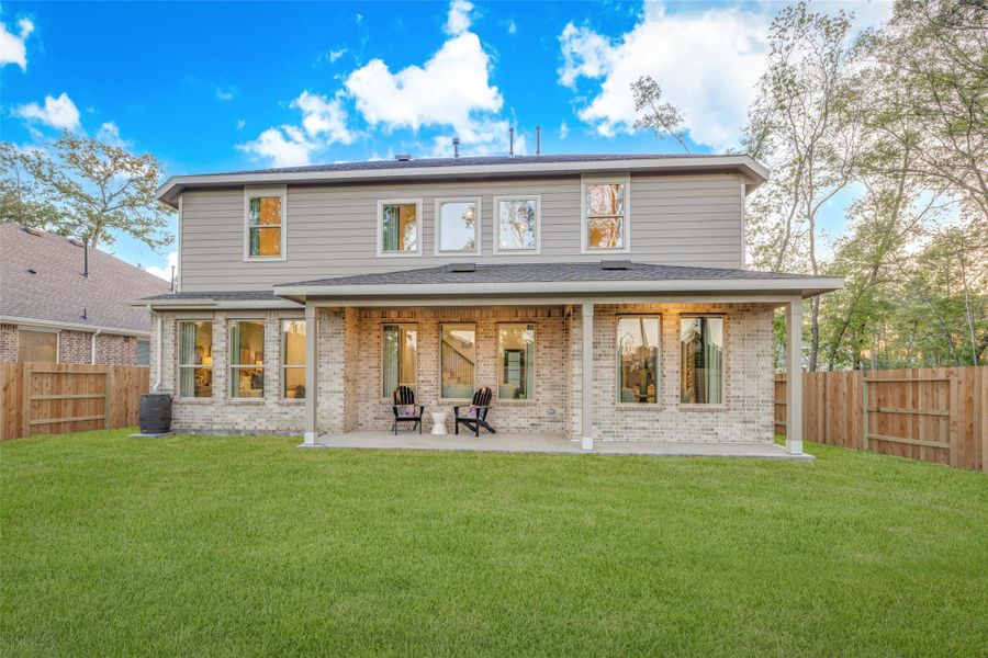 Exterior details and patio area of a home in Anniston, Katy (Image 3).