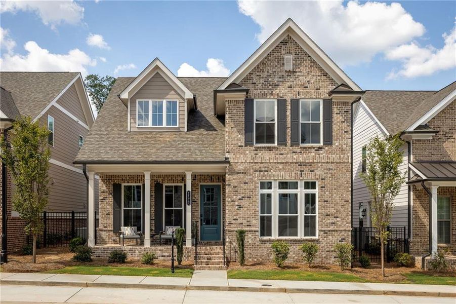 Front exterior of a new home in Evanshire Single Family, Duluth, GA, highlighting curb appeal (Image 28). Front exterior of a new home in Evanshire Single Family, Duluth, GA, highlighting curb appeal (Image 28).