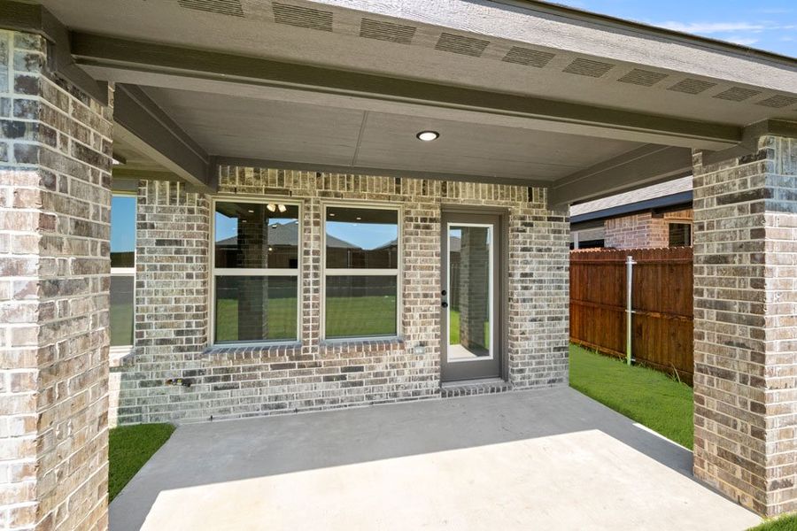 Front exterior of a new home in Baker Farms, Cleburne, TX, highlighting curb appeal (Image 10). Front exterior of a new home in Baker Farms, Cleburne, TX, highlighting curb appeal (Image 10).