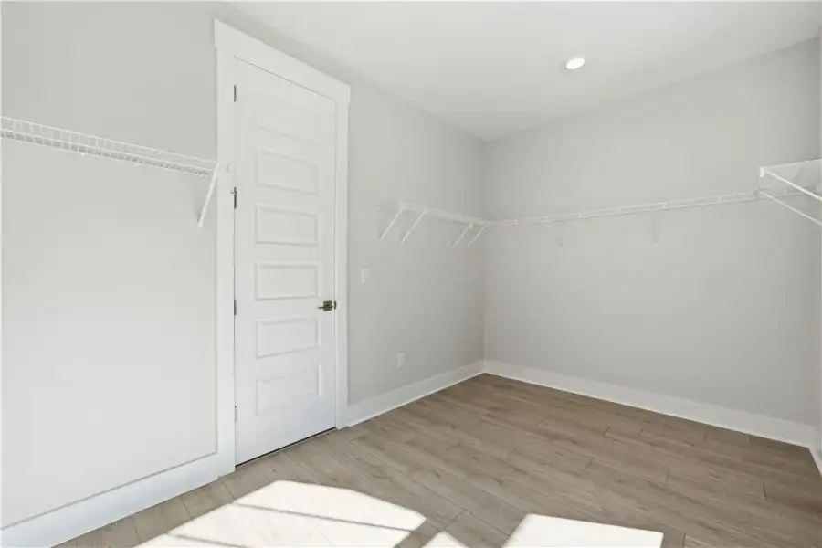 Ample wire shelving lines this functional walk-in