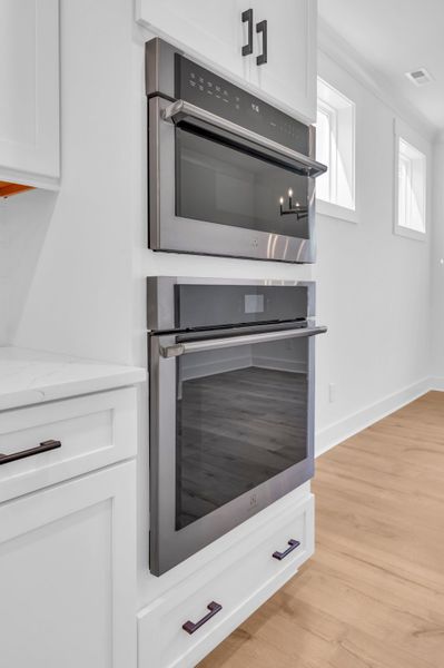 Representative furnished interior of a home built from the The Bradley by RobuckHomes in Windwater, Hampstead (Image 58).