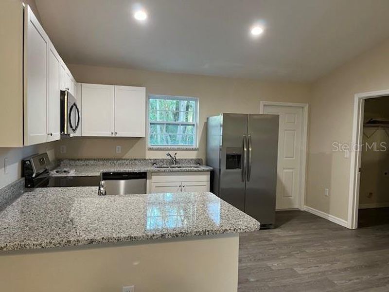 Furnished interior view inside a new home in , Summerfield (Image 8).