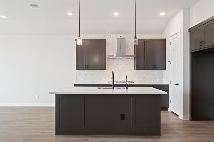 Furnished interior view inside a new home in Lagos Reserve, Manor (Image 13).