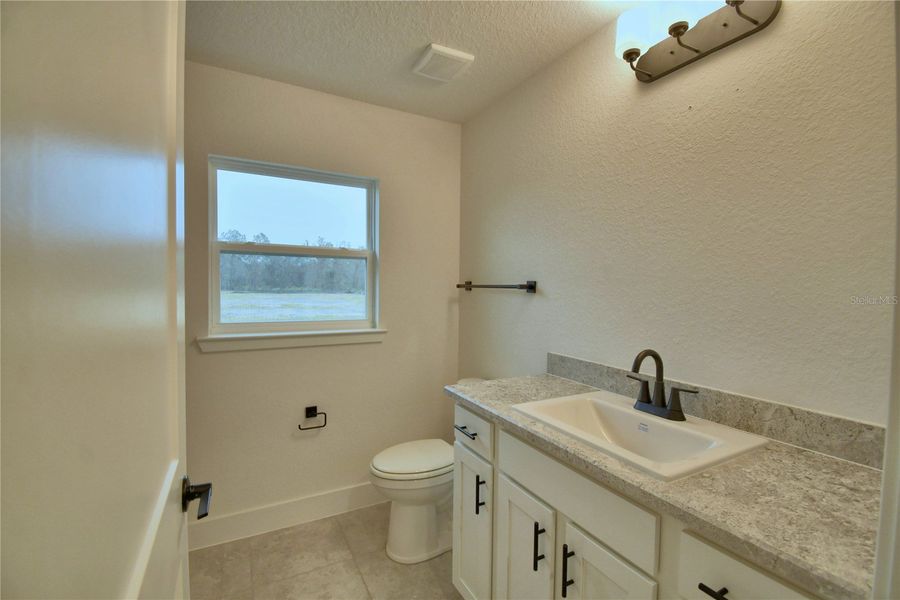 Furnished interior view inside a new home in Cadence Crossing, Auburndale (Image 14).