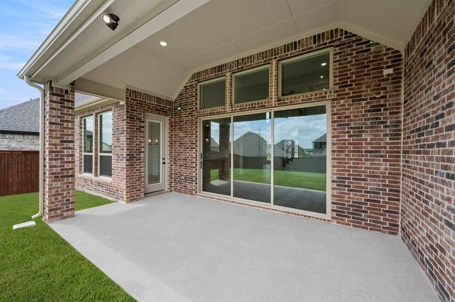 Exterior details and patio area of a home in La Frontera, Fort Worth (Image 3).
