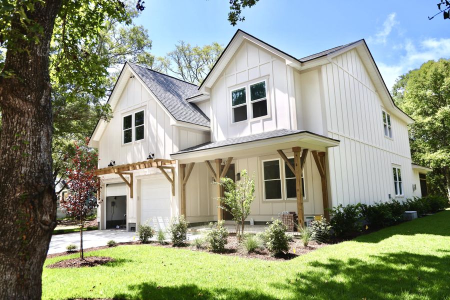 Front exterior of a new home in , Awendaw, SC, highlighting curb appeal (Image 19). Front exterior of a new home in , Awendaw, SC, highlighting curb appeal (Image 19).