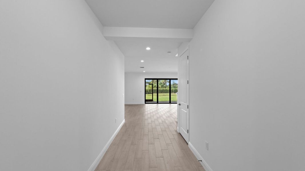 Spacious, unfurnished interior of a new home in SkySail, Naples (Image 16).