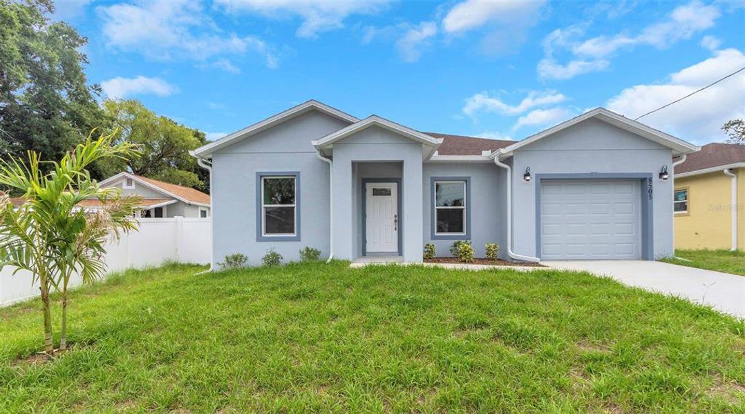 Front exterior of a new home in , Tampa, FL, highlighting curb appeal (Image 28).