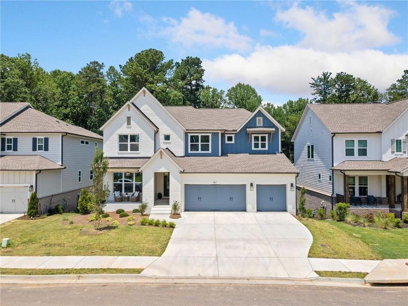 Front exterior of a new home in , Woodstock, GA, highlighting curb appeal (Image 27). Front exterior of a new home in , Woodstock, GA, highlighting curb appeal (Image 27).