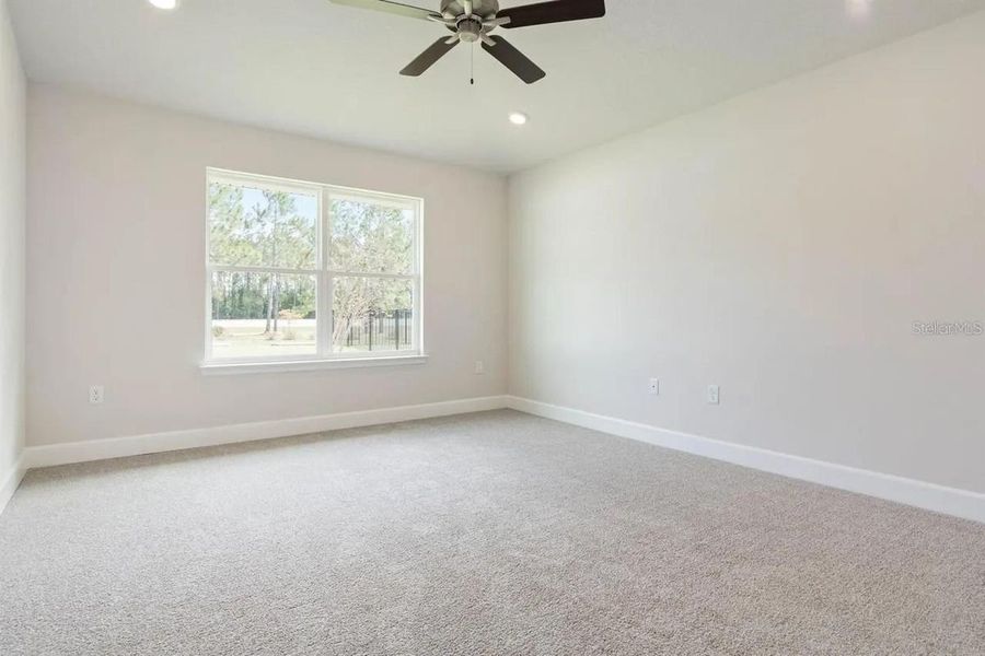 Representative unfurnished interior of a home built from the 1512 by Adams Homes in Winding Oaks, Weeki Wachee (Image 14).
