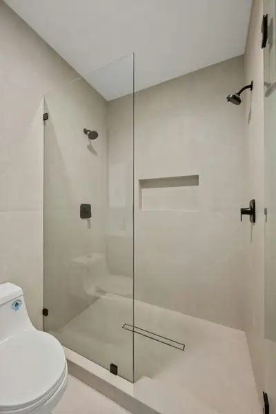 Bathroom featuring walk in shower