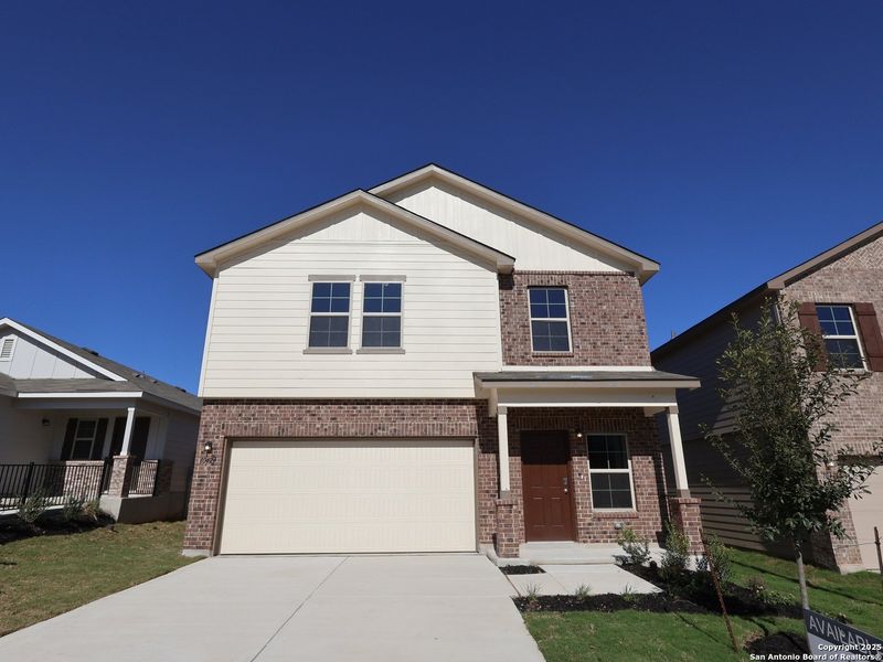 Front exterior of a new home in Paloma Park, Converse, TX, highlighting curb appeal (Image 24). Front exterior of a new home in Paloma Park, Converse, TX, highlighting curb appeal (Image 24).
