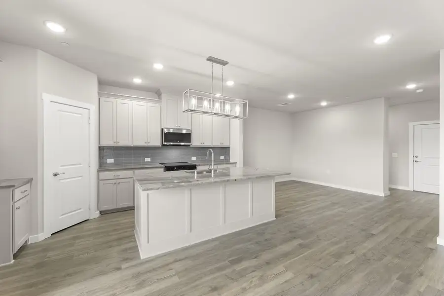Furnished interior view inside a new home in Wildridge, Oak Point (Image 5).