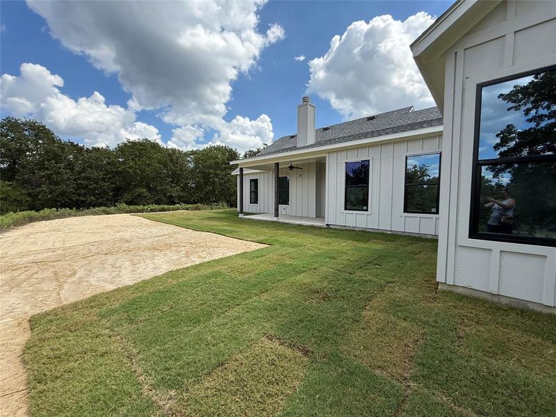 Front exterior of a new home in Zion Trails, Poolville, TX, highlighting curb appeal (Image 28). Front exterior of a new home in Zion Trails, Poolville, TX, highlighting curb appeal (Image 28).