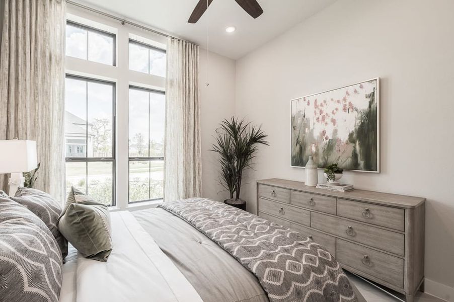 Representative furnished interior of a home built from the Carignan by Tri Pointe Homes in Legacy Grove, Montgomery (Image 33).