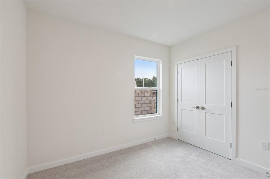 Spacious, unfurnished interior of a new home in Grasslands West, Lakeland (Image 24).