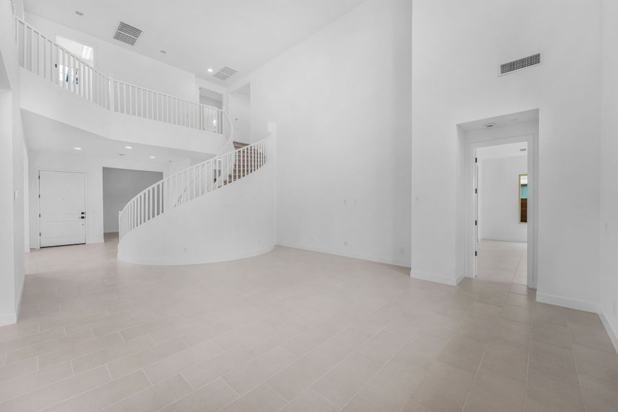 Spacious, unfurnished interior of a new home in Ellsworth Ranch Voyage Collection, Queen Creek (Image 11).