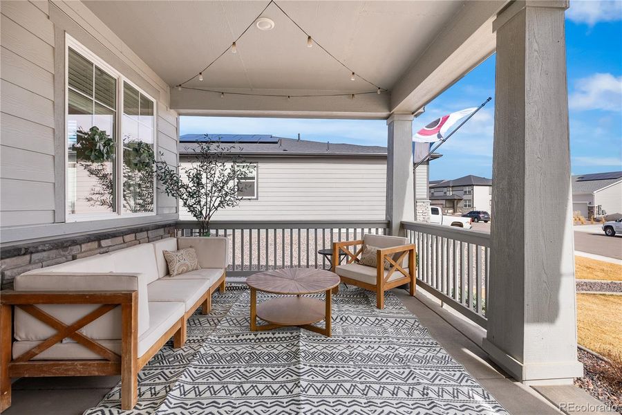 Exterior details and patio area of a home in Poudre Heights: The Alpine Collection, Windsor (Image 4).