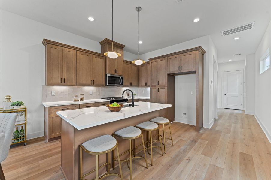 Kitchen has plenty of storage.