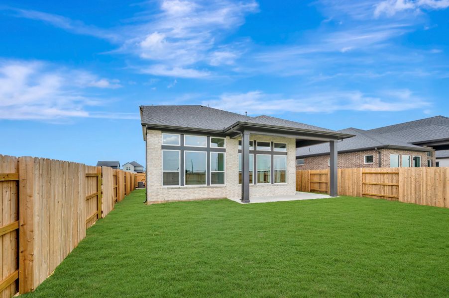 Exterior details and patio area of a home in Elyson - Reserve Collection, Katy (Image 3).