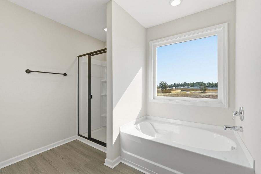 Representative furnished interior of a home built from the The Chatman by RTS Homes in The Gardens at 15 West, Hinesville (Image 16).