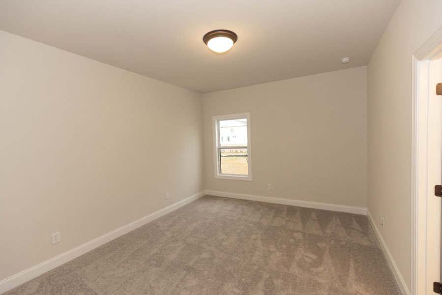 Representative unfurnished interior of a home built from the The Tensley by The Providence Group in Waterhaven, Cumming (Image 35).