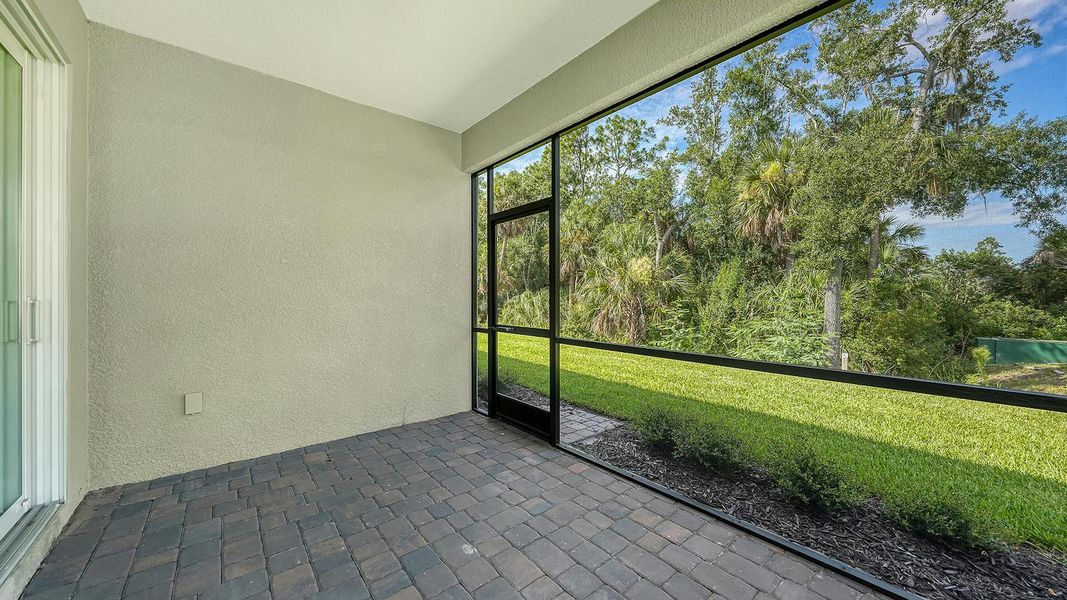 Exterior details and patio area of a home in Wildleaf Real Estate and Homes for Sale in Parrish, FL - Neal Communities, Parrish (Image 3).