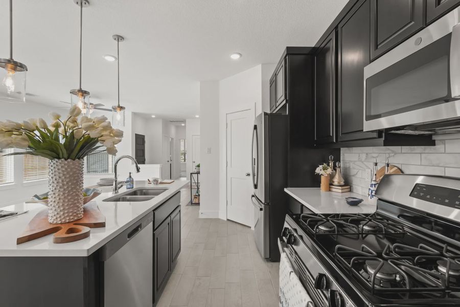 Representative furnished interior of a home built from the Chalet by Chesmar Homes in Meridiana Townhomes, Iowa Colony (Image 15).