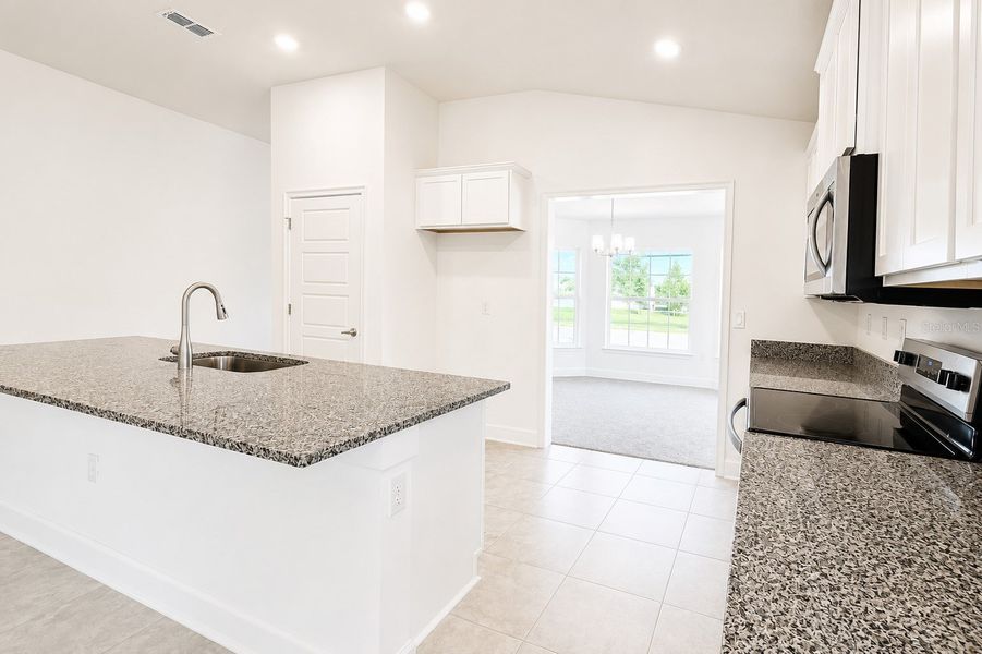 Furnished interior view inside a new home in Harmony Central, St. Cloud (Image 10).