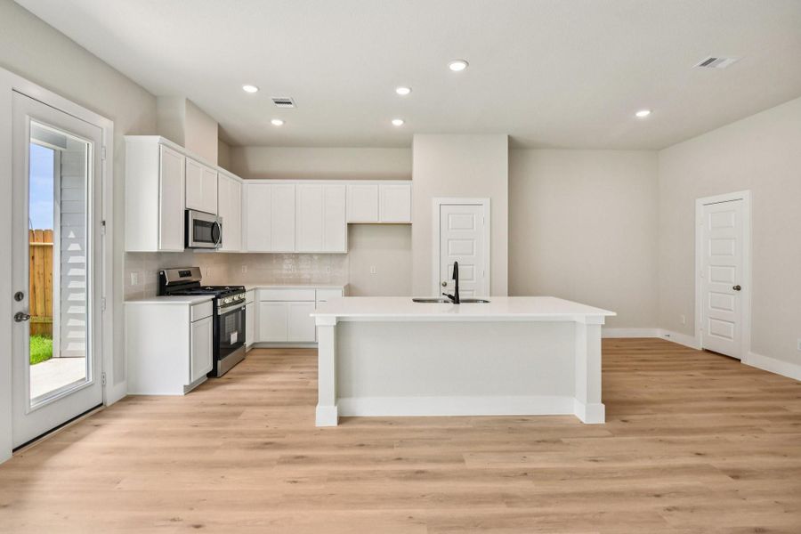 Furnished interior view inside a new home in Alicante, Houston (Image 9).