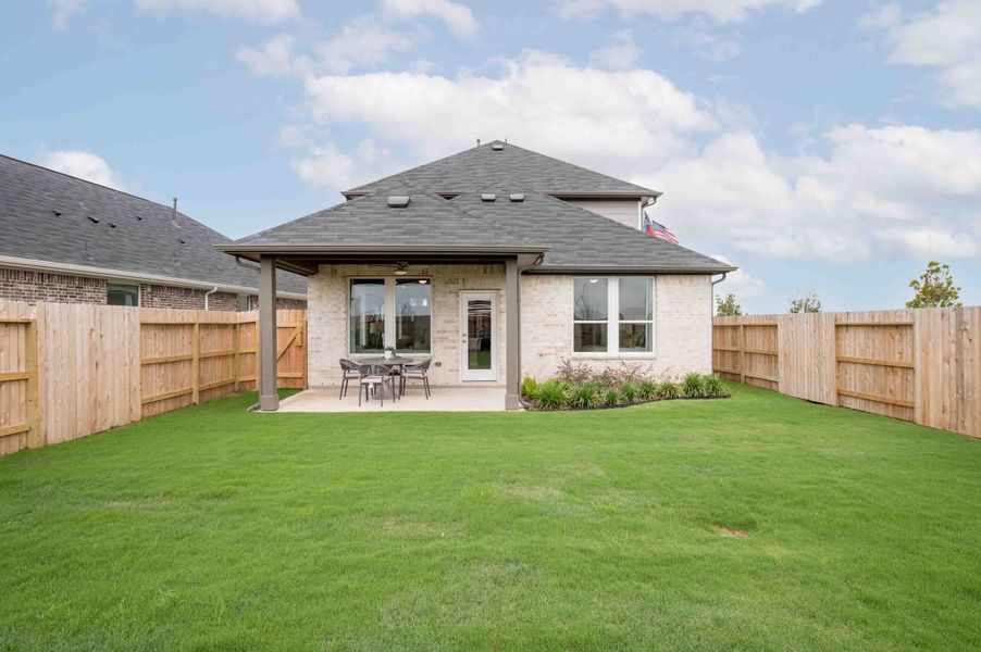 Exterior details and patio area of a home in The Ridge at Mason Woods, Cypress (Image 4). Exterior details and patio area of a home in The Ridge at Mason Woods, Cypress (Image 4).