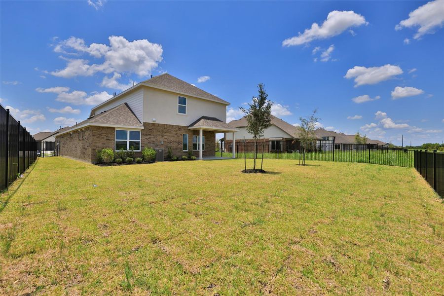 Exterior details and patio area of a home in River Ranch, Dayton (Image 3). Exterior details and patio area of a home in River Ranch, Dayton (Image 3).