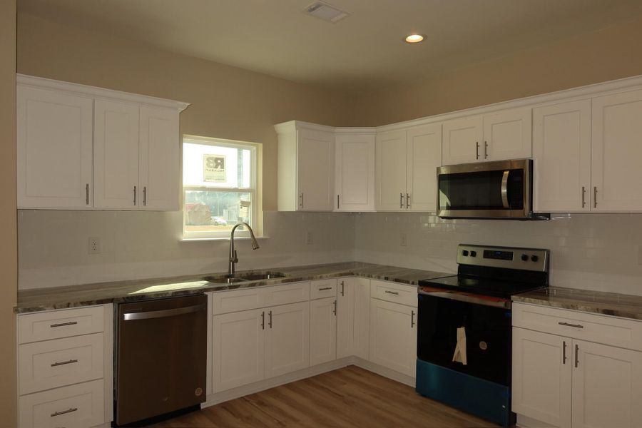 Furnished interior view inside a new home in , Santee (Image 3).