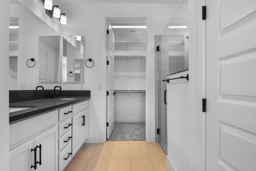 Furnished interior view inside a new home in CantaMia at Estrella 55+, Goodyear (Image 10).