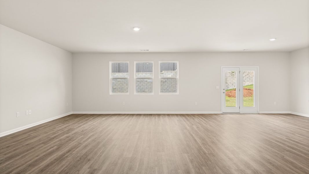 Representative unfurnished interior of a home built from the Avion by D.R. Horton in Brooks Station, Dacula (Image 9).