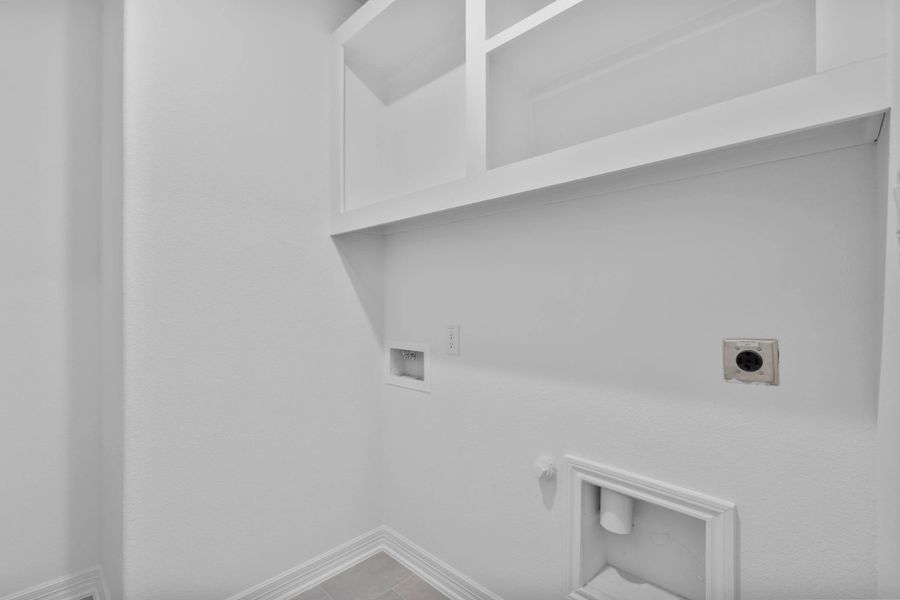 The utility room is both functional and refined, designed to support daily routines with ease. The utility room is both functional and refined, designed to support daily routines with ease.